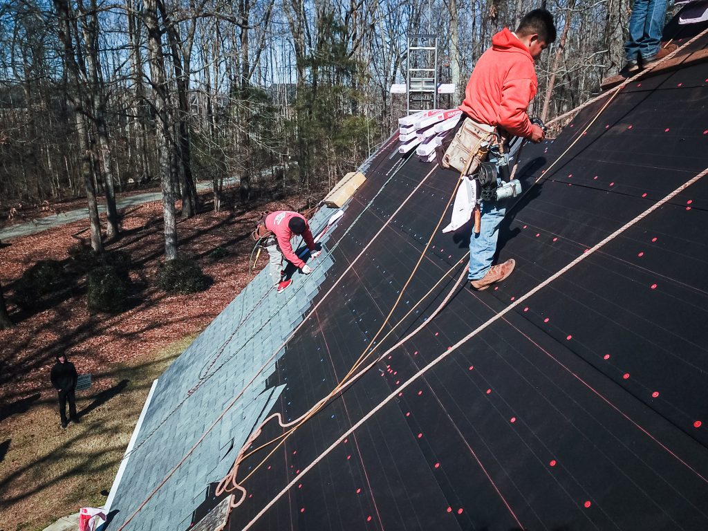 Roof Replacement, shingle installation.